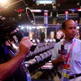 Photo: Reasey Poch of VOA's Khmer Service reports from the floor of the Tampa Bay Times Forum