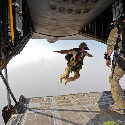 Photo: Photo of the Day: A U.S. Air Force pararescueman with the 82nd Expeditionary Rescue Squadron (ERQS) jumps out of the back of an HC-130P Combat King aircraft attached to the 81st ERQS over the Grand Bara Desert, Djibouti, July 30, 2012. The 82nd ERQS and pararescuemen with the 81st ERQS conducted training exercises in support of Combined Joint Task Force-Horn of Africa. DOD photo by Tech. Sgt. Donald Allen, U.S. Air Force