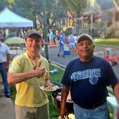 Photo: Happy Labor Day Weekend! Mike looks forward to meeting constituents at block parties around the district.  Thanks to Miguel Martinez for the great food at last weekend’s event in Roscoe Village.  How are you celebrating the last days of summer?