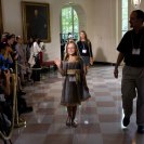 Photo: Kayla Wayman, 9, from Montana, waves to the media in the East Garden Room as she arrives for the Kids’ State Dinner at the White House, Aug. 20, 2012. Kayla submitted a recipe for "Kayla's Garden Chicken Pizza". (Official White House Photo by Sonya N. Hebert)