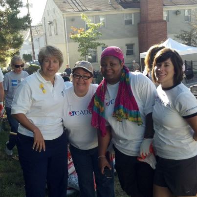 Photo: At a 9/11 Day service project this morning, CEO Wendy Spencer pauses to pose with a few CADCA VetCorps AmeriCorps members.
