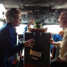 Photo: NOAA Administrator Dr. Jane Lubchenco confers with Dr. Robert Detrick, assistant administrator for NOAA's Office of Oceanic and Atmospheric Research, aboard one of NOAA's WP-3D Orion hurricane hunter planes during an August 26 flight to investigate Tropical Storm Isaac. Photo: NOAA.
