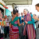 Photo: U.S. Secretary of State Hillary Clinton, accompanied by U.S. Ambassador to Timor-Leste Judith R. Fergin, is greeted by traditional dancers at the Cooperativa Cafe Timor in Dili, Timor-Leste, September 6, 2012. Established in 1994 with the support of USAID, the self-supporting cooperative has now expanded to vanilla, clove, cacao, and cassava production for export. [UNMIT photo by Bernardino Soares]
