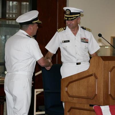 Photo: Capt. Patrick J. Neher retired after 29 years of service in the Navy at the Washington Navy Yard on Aug. 23. He most recently served at Combined Joint Interagency Task Force 435, deployed in Afghanistan, from February 2011 to May 2012. After initially serving as the staff judge advocate, he was picked to join the U.S. delegation negotiating a Strategic Partnership Agreement with Afghanistan. In recognition of his role in the negotiations for a Strategic Partnership Agreement between the U.S. and Afghanistan, and supporting Memorandums of Understanding on the transition of detentions and the Afghanization of special operations, Neher was presented the Defense Superior Service Medal, Joint Meritorious Service Medal, and Department of State Distinguished Honor Award.