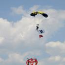 Photo: Retired Navy SEAL Jim Woods flies the Chicago Cubs flags over Wrigley Field, August 15 2012