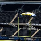Photo: Retired Navy SEAL, Safety Officer Jim Woods flies his canopy into Soldier Field during a practice jump, August 17 2012