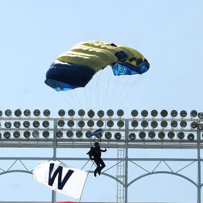 Photo: From today's practice jump at Wrigley Field.  That's team member Jim Woods pulling for a big Win for the Cubs at tomorrow's game where the Frogs will be jumping during the opening ceremonies.