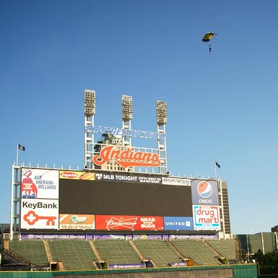 Photo: SO1 (SEAL) Justin Gonzales flies his canopy over Progressive Field during a practice jump, Friday August 31 2012