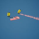 Photo: PR1 Tom Kinn flies an American flag, followed by Master Chief Special Warfare Operator (SEAL) Mike Gillett over Coronado beach, September 7 2012
