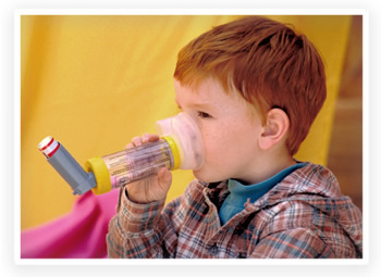 A child uses an asthma inhaler