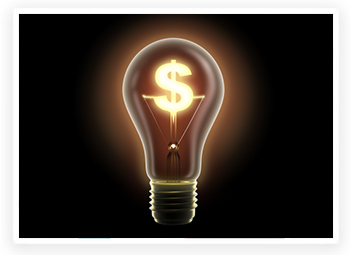 A brightly lit light bulb with a dollar sign as the filament 