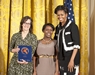 photo of Teri Hein, Meron Kasahun, and Michelle Obama
