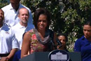 Michelle Obama Speaking at podium on souht lawn of the White House