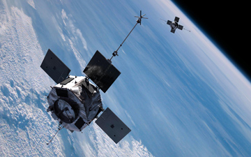 Artist's concept of the twin RBSP spacecraft in orbit around Earth. Credit: NASA