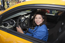 Secretary Solis enjoys the view from a Mustang built at the plant. View the slideshow for more images and details.
