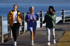 Photograph of three women walking