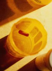 Photograph of an almost-empty pill vial