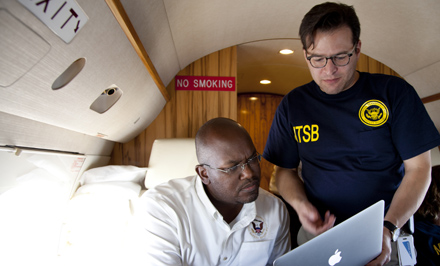 Public affairs staff members Eric Weiss and Antion Downs during a recent NTSB launch.