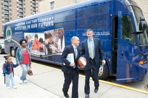 Secretary Duncan in front of last year's bus