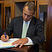 Speaker John Boehner signs a condolence book for the family of U.S. Ambassador Chris Stevens at the U.S. Capitol. September 13, 2012. (Official Photo by Bryant Avondoglio)

--
This official Speaker of the House photograph is being made available only for publication by news organizations and/or for personal use printing by the subject(s) of the photograph. The photograph may not be manipulated in any way and may not be used in commercial or political materials, advertisements, emails, products, promotions that in any way suggests approval or endorsement of the Speaker of the House or any Member of Congress.