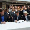 Noted Conservationist Louis Bacon signs the Memorandum of Agreement for the establishment of the Sangre de Cristo Conservation Area.