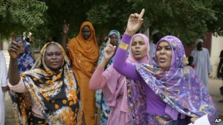 Sudanese women chant slogans during a protest in Khartoum, Sudan, Sept. 14, 2012.