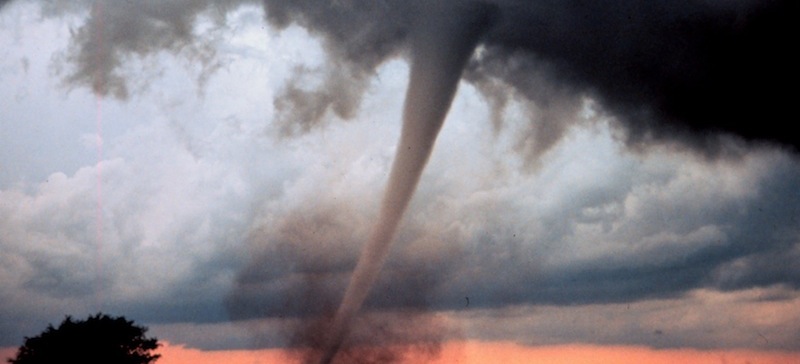 A tornado funnel cloud