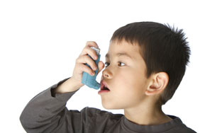 Little Boy Using an Inhaler