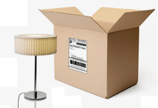 Image of a lamp standing beside a brown cardboard box
