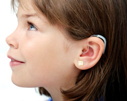 Foto: niña con audífonos