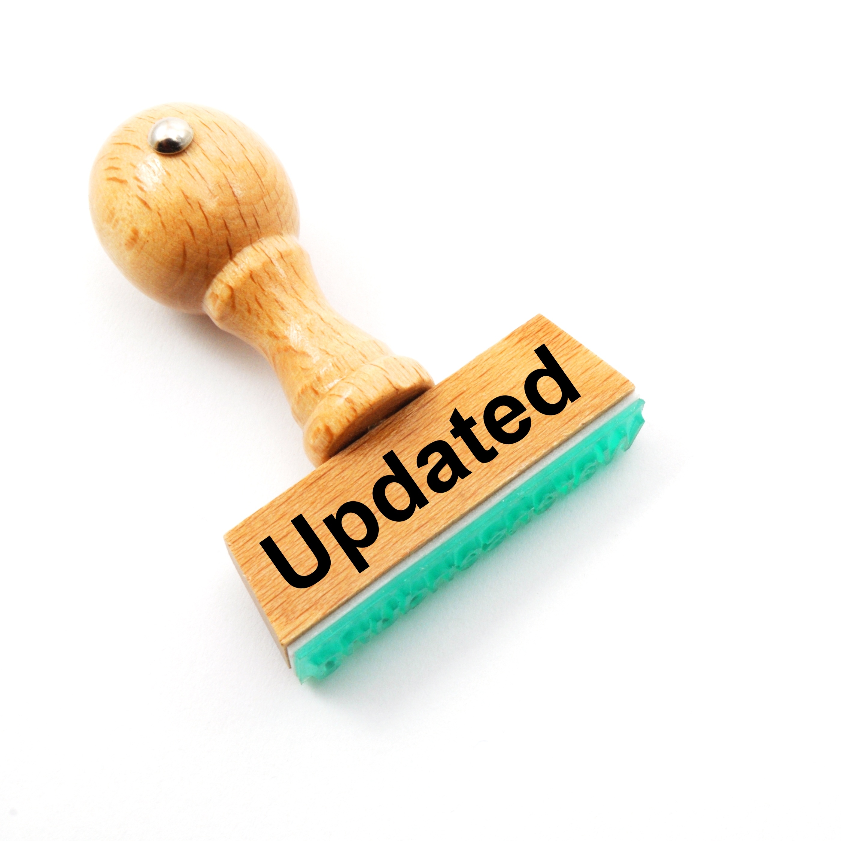 A woodblock ink stamp that reads "Updated"