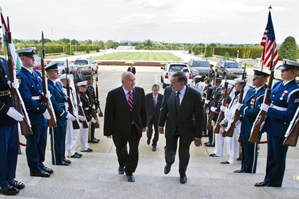 Defense Secretary Leon E. Panetta escorts Hungarian Defense Minister Csaba Hende through an honor cordon into the Pentagon, Sept. 14, 2012.