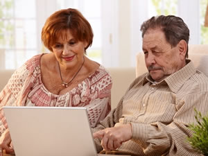 Older couple researching health information online