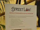 Street Law program information greeting awards dinner guests.