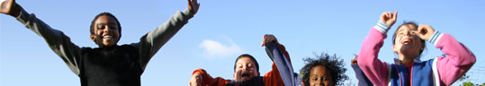 Healthy kids shown against the background of a sky.