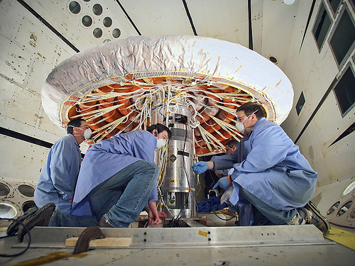 Image description: Though it may resemble a giant mechanical mushroom, the device these scientists are working on is an inflatable heat shield to slow and protect spacecraft as they blaze through the atmosphere at hypersonic speeds. When deflated, the 10-foot shield can be packed into a 22-inch diameter rocket.
NASA will test the heat shield with a launch early in the morning on Saturday, July 21. Watch it live.
Photo by NASA.