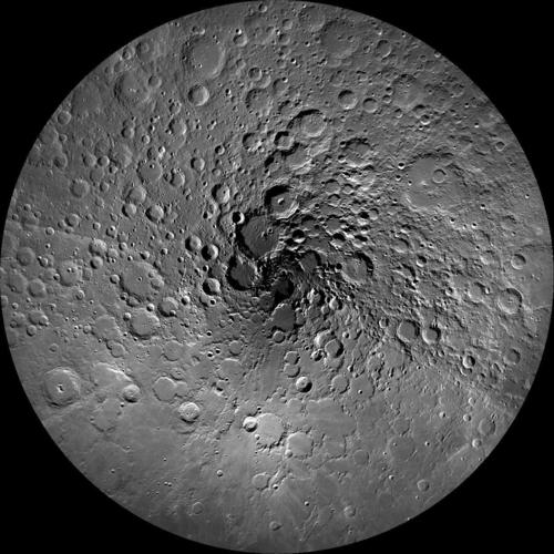Image description: This photo of the moon&#8217;s north polar region was taken by NASA&#8217;s Lunar Reconnaissance Orbiter Camera, or LROC. One of the primary scientific objectives of LROC is to identify regions of permanent shadow and near-permanent illumination. Since the start of the mission, LROC has acquired thousands of wide angle camera images and combined them to produced this mosaic, which is composed of 983 images taken over a one month period during northern summer. 
Image courtesy of NASA