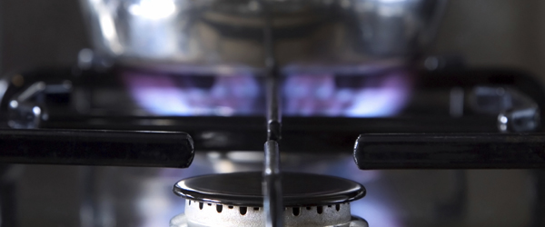 Close up of a burning gas on a stove burner