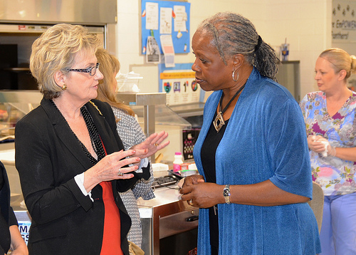 FNS Administrator Audrey Rowe chats with West Virginia Superintendent of Schools Dr. Jorea Marple  at a Back To School Breakfast Event at Piedmont Year-round Elementary School in Charleston, West Virginia August 7.