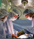 Surgery team performs a transplant