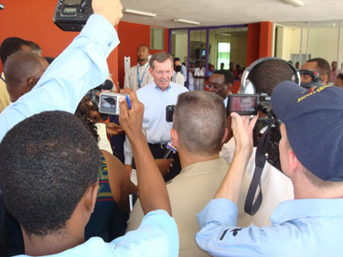 Secretary Mike Leavitt and Haiti Minster of Health Robert Auguste answer questions at a press conference at the University Hospital de la Paix in Port-au-Prince, Haiti.