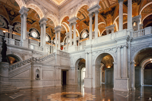 Image description: This photo is of the Great Hall in the Library of Congress&#8217; Thomas Jefferson Building. It is recognized as a premier example of the Beaux Arts style, which is theatrical, heavily ornamented, and kinetic. It is a style perfectly suited to a young, wealthy, and imperialistic nation in its Gilded Age.
Photo by the Architect of the Capitol