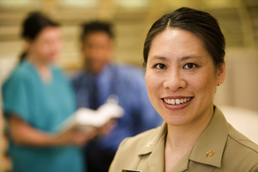 United States Public Health Service Commissioned Corps pharmacist in a clinical setting