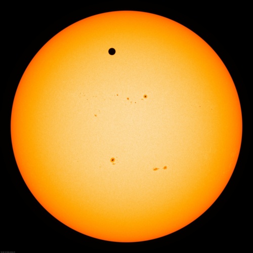 Image description: Venus passing across the face of the sun, producing a silhouette that no one alive today will likely see again. 

Watch NASA&#8217;s live coverage of the Transit of Venus.

Image from NASA&#8217;s Astronomy Picture of the Day.