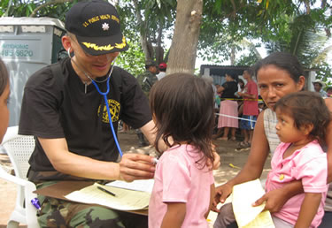 CDR Izune Hwang, is a Commissioned Corps family practice physician assigned to the Centers for Disease Control and Prevention.  CDR Hwang evaluates patients at Escuela El Higueral in Guatemala, a small sugar cane harvesting community that has not had access to a health care provider in over 10 years.