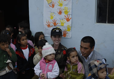 LT Elizabeth Leavitt, a health services officer with the Mayor of Huara, Peru, and many pediatric patients.