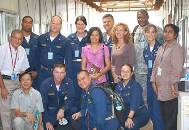 Photo: CAPT Ana Maria Osorio and LCDR Andrew Sallach, along with members of the USNS Mercy Preventive Medicine Team, meet with representatives from the Timor Lest Ministry of Health and the World Health Organization.  