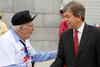 Senator Blunt visits with Oscar, a 100 year old WWII veteran on the Central Missouri Honor Flight to Washington D.C. on 5/8/2012.