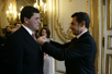 Photo of Dr. Elias Zrehouni and French President Nicolas Sarkozy.