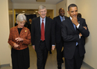 A photo of President Obama, Secretary Sebelius and Dr. Collins walking together.